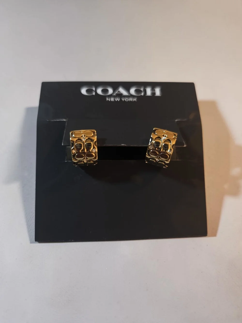 Coach Gold-Tone Signature Pattern Huggie Earrings - Picture 1 of 2